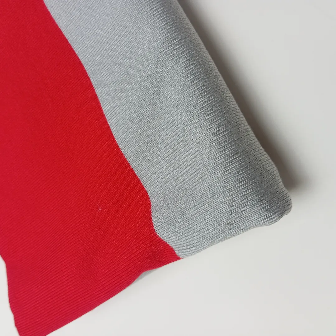 Cozy Up in Style: Red-Grey Bicolor Poncho - Image 8